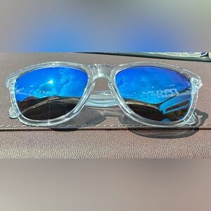Oakley Sunglasses: Clear Frame with Prism Sapphire Blue Polarized Lenses